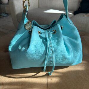 Coastal resort minimalist slouchy pebbled leather drawstring bucket shoulder bag